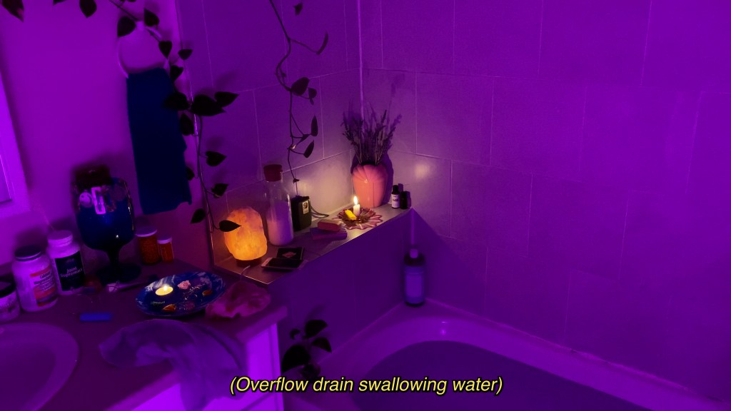 Purple light casts over bathtub full of water and caption that reads "(Overflow drain swallowing water)"