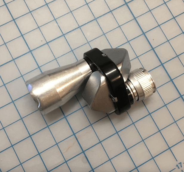 My monocular, the one I was given as a child in the 90’s, lays on the self-healing mat I had in my dorm room in undergrad. It’s the oldest monocular I own and doesn’t work anymore. I keep it out of nostalgia. I’ve dropped it many times, which is visible in its dents. It’s missing the rubber guard that protects your eye when you use it. This object feels like another limb, a hand, fingers. Holding It feels like holding the hand of my 7 year old self.