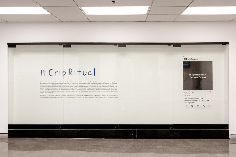 View of #CripRitual logo in purple text and small installation description text on the left, and one piece from the Shitty Alt Text series by Alex Haagaard on the right. 